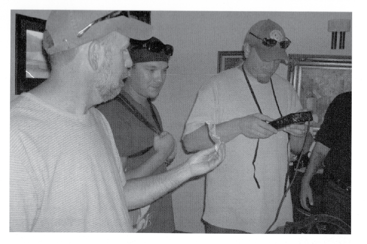 three_guys_holding_jaw_bone